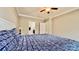 This bedroom features neutral walls, carpet flooring, ceiling fan and a large window to offer natural light at 3735 Norman View Dr, Sherrills Ford, NC 28673