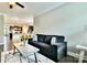 This expansive living room features wood flooring, a ceiling fan and offers access to the kitchen at 3735 Norman View Dr, Sherrills Ford, NC 28673
