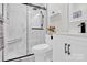 Bathroom featuring a glass enclosed shower with black hardware and neutral decor throughout at 4108 Mellon Rd, Matthews, NC 28104