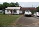 Charming single-Gathering home with a metal roof, carport, and mature trees at 5004 King Wilkinson Rd, Denver, NC 28037