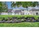 Well-maintained backyard with lush grass, a storage shed, and tasteful landscaping at 5748 Timbertop Ln, Charlotte, NC 28215