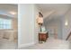 Cozy upstairs hallway featuring a cushioned bench and a glimpse into a serene bedroom at 5748 Timbertop Ln, Charlotte, NC 28215