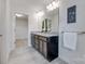 Bathroom featuring dual vanity, granite countertops, and a view of the walk-in closet at 5836 Clan Maclaine Dr, Charlotte, NC 28278