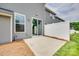 Private patio area with sliding glass doors and a privacy fence at 5836 Clan Maclaine Dr, Charlotte, NC 28278