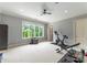 Bright gym with large windows, exercise equipment, and ample space for a healthy lifestyle at 5915 Vidal Ln, Charlotte, NC 28226