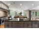Kitchen with a large kitchen island, granite countertops, and modern appliances at 5915 Vidal Ln, Charlotte, NC 28226