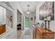 Welcoming foyer boasts tiled floors and elegant decor, setting a sophisticated tone for the rest of the home at 592 Woodcrest Dr, Gastonia, NC 28056