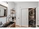 Laundry room with front-loading washer/dryer, sink and stylish fixtures at 592 Woodcrest Dr, Gastonia, NC 28056