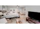 Spacious main bedroom with a full en-suite bathroom and sitting area, promoting relaxation and comfort at 592 Woodcrest Dr, Gastonia, NC 28056