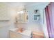 Unique bathroom with floral wallpaper, vintage fixtures, and ample storage space at 6300 Mount Pleasant S Rd, Concord, NC 28025