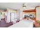 Open dining and living area featuring hardwood floors, fireplace and natural lighting at 6300 Mount Pleasant S Rd, Concord, NC 28025