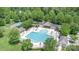 Aerial view of the community pool with lounge chairs, gazebo, and playground at 8829 Keller Ct, Huntersville, NC 28078