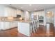 Modern kitchen with stainless steel appliances, a center island with bar seating, and custom cabinetry at 8829 Keller Ct, Huntersville, NC 28078