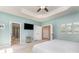 Large main bedroom with an ensuite bathroom and a television mounted on the wall at 8829 Keller Ct, Huntersville, NC 28078