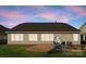 Spacious backyard with a patio, perfect for entertaining, and space for outdoor activities at 8830 Artesa Mill Ln, Charlotte, NC 28214