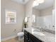 Bathroom featuring a granite vanity, toilet, and shower/tub combination at 8830 Artesa Mill Ln, Charlotte, NC 28214