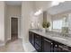 Bathroom with granite double vanity, walk-in closet and neutral paint at 8830 Artesa Mill Ln, Charlotte, NC 28214