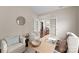 Cozy home office with a desk, chairs, and access to another room through French doors at 8830 Artesa Mill Ln, Charlotte, NC 28214
