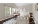 Bright home office featuring a vaulted ceiling, neutral walls, and large windows at 8830 Artesa Mill Ln, Charlotte, NC 28214