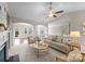 Bright living room with hardwood floors, open layout, and lots of natural light at 8830 Artesa Mill Ln, Charlotte, NC 28214