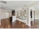 Open-concept living space showcases hardwood floors and seamless transitions for modern living at 8830 Artesa Mill Ln, Charlotte, NC 28214