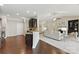 Open-concept layout connecting kitchen and living room, perfect for entertaining at 8830 Artesa Mill Ln, Charlotte, NC 28214