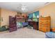 bedroom with bunk beds, ceiling fan and dresser at 8927 Comstock Ct, Locust, NC 28097