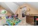 Bonus room featuring storage space and a play area at 8927 Comstock Ct, Locust, NC 28097