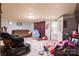 Comfortable living room with gray floors and outdoor view through door at 100 Lanier St, Mount Holly, NC 28120