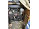 Close-up of a Formula 5.5 HP generator stored inside, highlighting its mechanical details and components at 102 Papoose Ct # D117, Mount Gilead, NC 27306