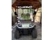 Close-up of golf cart showcasing its front design and rugged tires at 102 Papoose Ct # D117, Mount Gilead, NC 27306