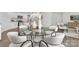 Bright dining area featuring a glass table and seating for six guests at 1053 Horizon Ln, Chester, SC 29706
