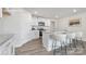Modern kitchen features white cabinets, granite countertops and stainless steel appliances at 1053 Horizon Ln, Chester, SC 29706