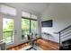 Balcony featuring outdoor seating with a view of lush greenery and the city at 115 E Park Ave # 428, Charlotte, NC 28203