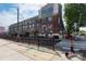 Attractive brick building with balconies located next to train tracks at 115 E Park Ave # 428, Charlotte, NC 28203