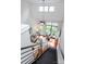 Bright living room featuring hardwood floors, a balcony, and modern furnishings, creating a stylish and inviting space at 115 E Park Ave # 428, Charlotte, NC 28203