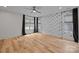 Large bedroom with hardwood floors, ceiling fan, neutral paint and natural light at 1207 Lakedell Dr, Charlotte, NC 28215