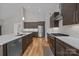 Modern kitchen with stainless steel appliances, gas range, tile backsplash, and ample counter space at 1207 Lakedell Dr, Charlotte, NC 28215