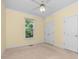 Bright bedroom featuring neutral carpeting, paint, and white trim at 122 Waterford Dr, Mooresville, NC 28117