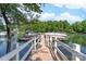 View of boat slips on a clear day with wood docks and white railings at 122 Waterford Dr, Mooresville, NC 28117