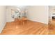 Open-concept living area with hardwood floors and lots of natural light, ideal for entertaining at 122 Waterford Dr, Mooresville, NC 28117