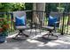 Cozy outdoor deck area with comfy furniture and a decorative pineapple at 122 Waterford Dr, Mooresville, NC 28117