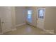 Well-lit bedroom featuring a closet and a window that provides natural lighting at 1245 Paddock Cir, Charlotte, NC 28209