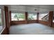 Enclosed brick patio with views of the backyard, perfect for relaxation and entertainment at 1245 Paddock Cir, Charlotte, NC 28209