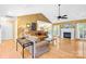 Comfortable living room featuring a fireplace, hardwood floors, and neutral decor at 125 Canopy Ct, Mooresville, NC 28115
