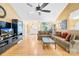 Open-concept living room with a view of the foyer and dining area at 125 Canopy Ct, Mooresville, NC 28115