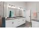 Bathroom features a double sink vanity with white cabinets and gray countertops at 127 Wickersham Dr, Statesville, NC 28625
