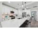 Bright kitchen features a large center island, stainless steel appliances, and pendant lighting at 127 Wickersham Dr, Statesville, NC 28625