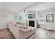 Bright living room boasts a fireplace, recessed lighting, and a cozy sectional sofa at 127 Wickersham Dr, Statesville, NC 28625