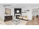 Inviting living room featuring a cozy fireplace, stylish decor, and an open layout for comfortable living at 130 Parker Claire Ln, Kings Mountain, NC 28086